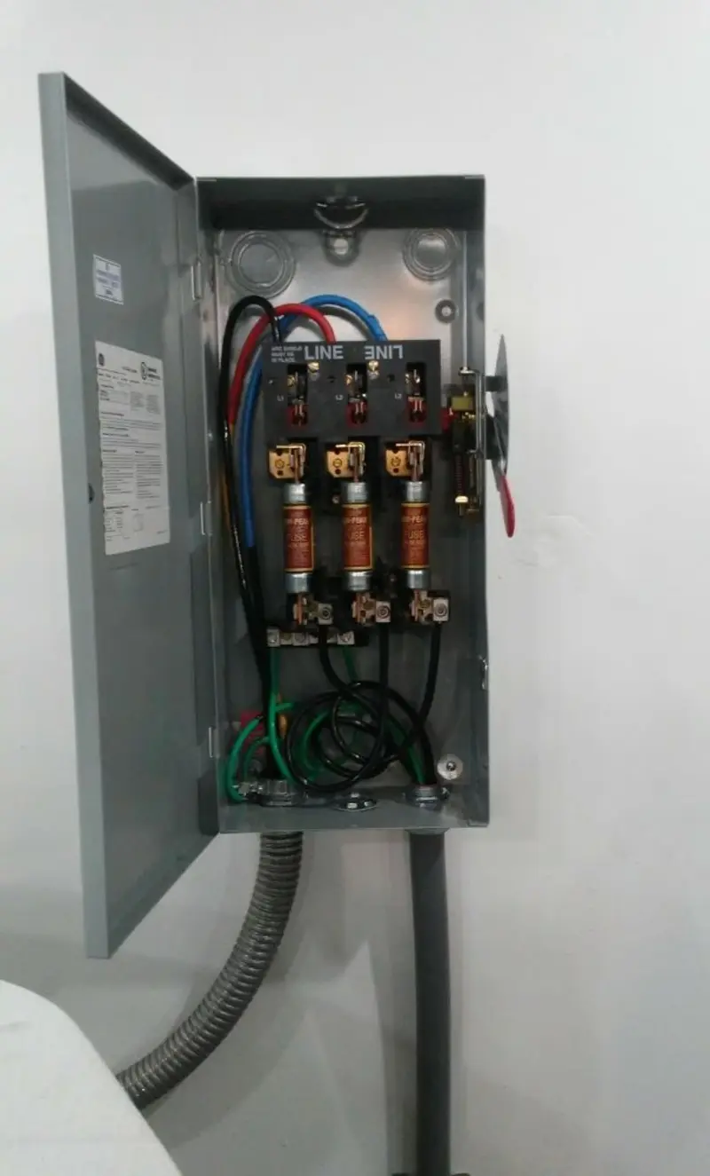 Three-phase disconnect switch installed for Smoke Detector Installation in Ravenna