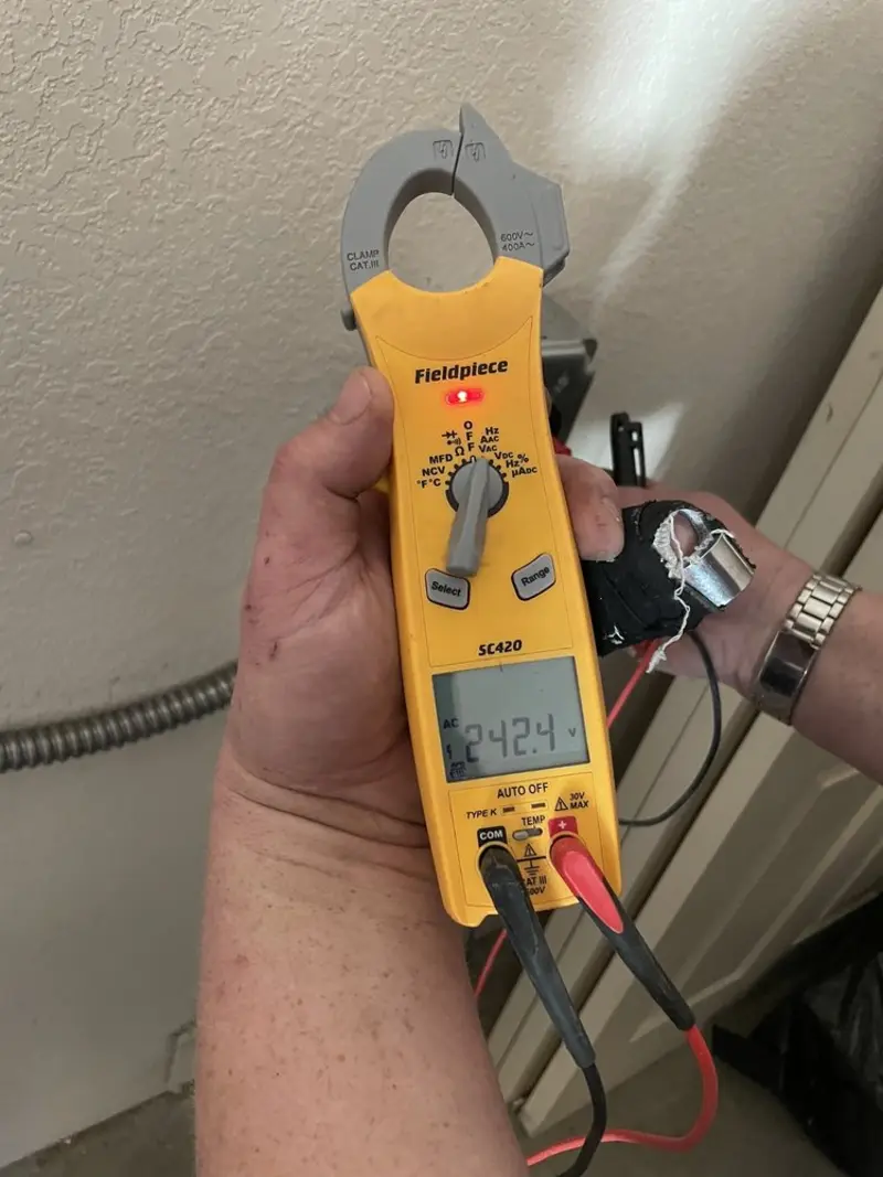 Voltage testing with clamp meter during Circuit Breaker Repair in Ravenna